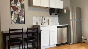 Fridge, microwave, coffee/tea maker, toaster