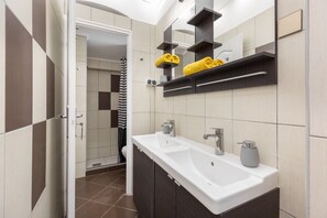 Hair dryer, towels, soap, shampoo