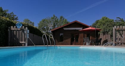 Chalet with private pool overlooking meadow and woodland 