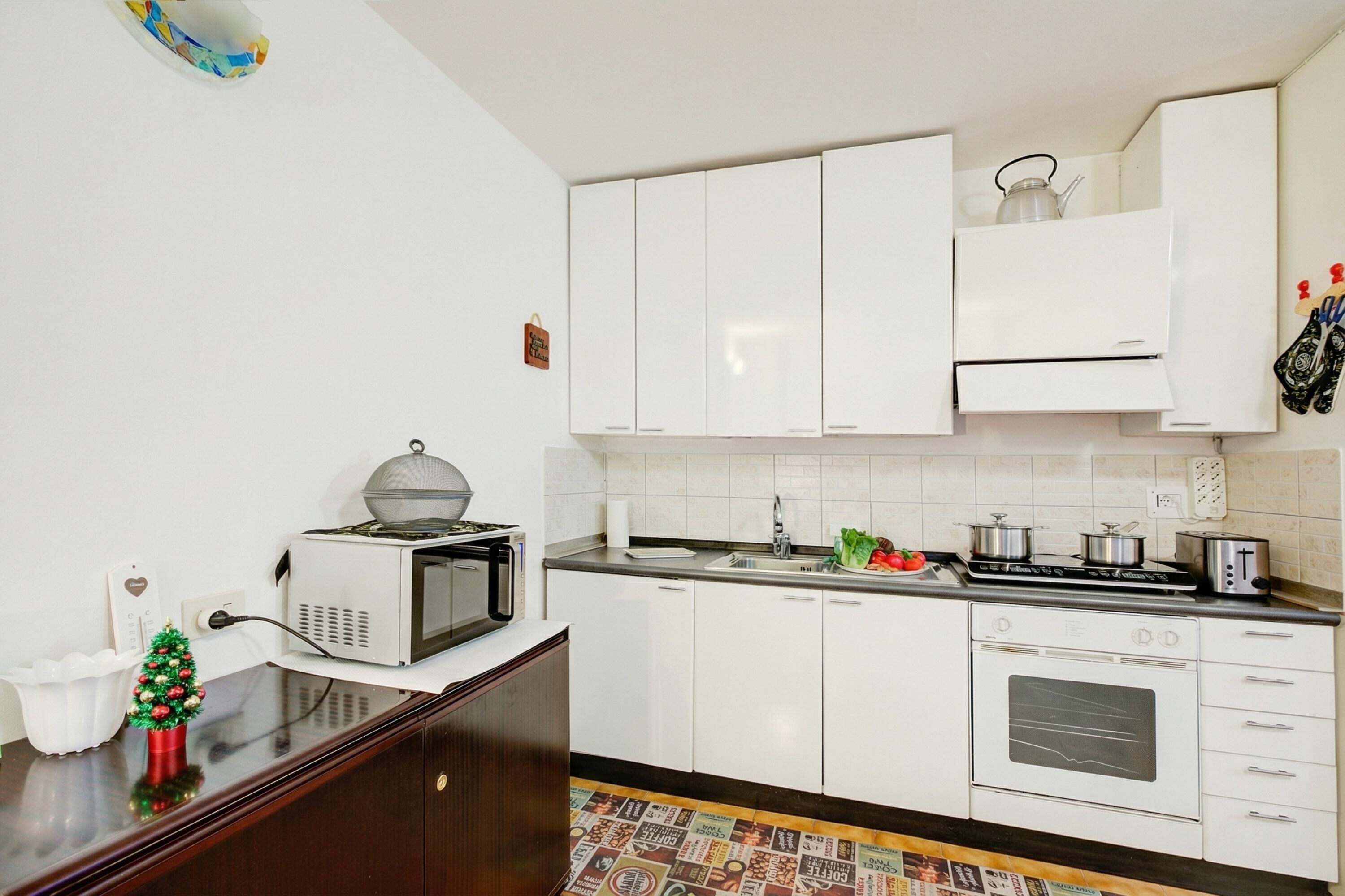 Familienapartment, 1 Schlafzimmer, Balkon (Studio Saturno 23 in the city center) | Eigene Kochnische | Esstisch