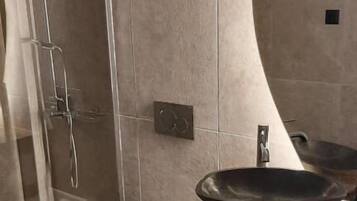 Departamento Deluxe | Baño | Pantuflas