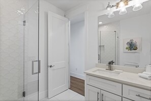 Shower, hair dryer, towels