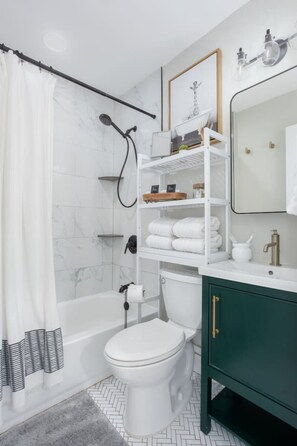 Hair dryer, towels, soap, shampoo