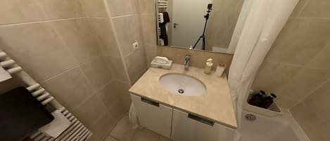 Hair dryer, towels, soap, toilet paper