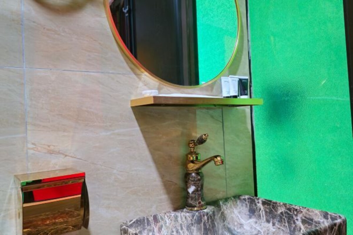 Bathroom | Shower, hair dryer, slippers, towels