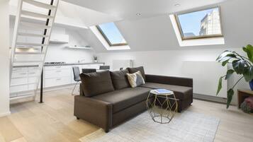 Family Studio Suite | Individually furnished, laptop workspace, blackout curtains