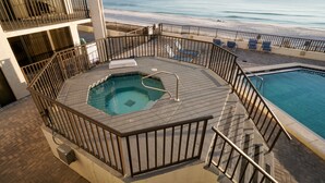 A rooftop pool area with a view of the beach, a hot tub, and a smaller pool. - Gulf-Front at Aquavista w/ Pool, Hot Tub & Sunset Views (Panama City Beach)