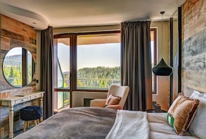 Deluxe Room, Balcony, Mountain View | Minibar, desk, blackout curtains, iron/ironing board