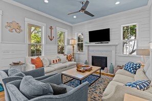Smart TV, fireplace, books, offices