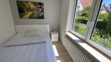 1 Schlafzimmer, Reisekinderbett, kostenloses WLAN, Bettwäsche