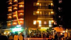 A multi-story building with balconies and a restaurant on the ground floor. - Hotel Ristorante delle Valli  (Germagnano)