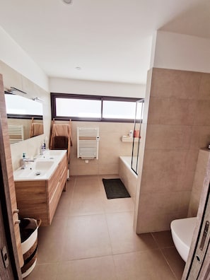 Shower, hair dryer, towels, soap