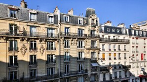 A row of historic European-style buildings with multiple stories, balconies, and a variety of window styles. - 41.Studio 2Pers#Sèvres-Lecourbe#Necker (Paris)