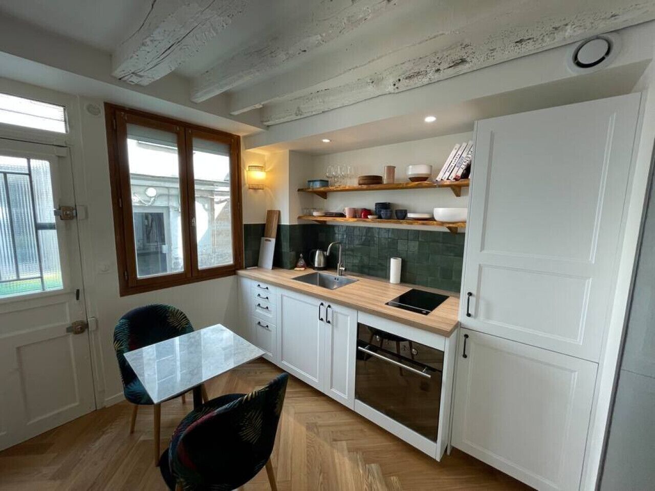 Fridge, oven, coffee/tea maker, cookware/dishes/utensils