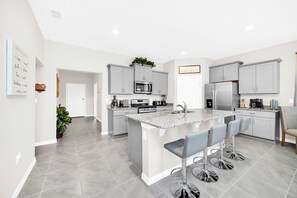 Fridge, microwave, oven, stovetop - Spectacular Family Home with Pool and Spa-7704OML (Davenport)