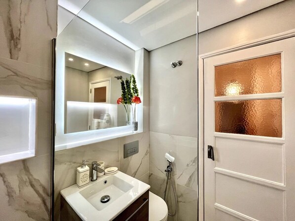 Hair dryer, towels, soap, toilet paper