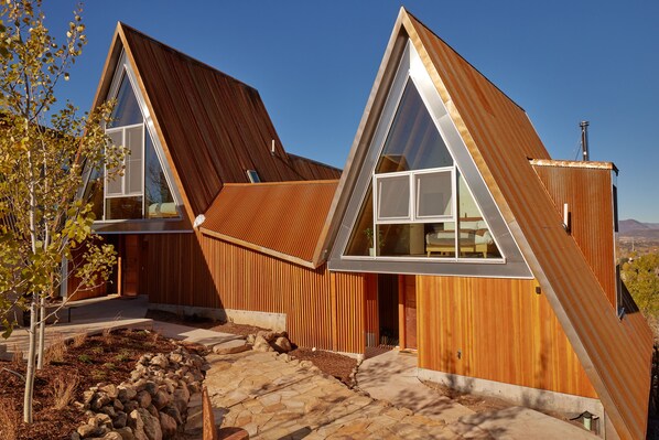 A modern house with a sloped roof and large windows. - Alpine House #2  + Nordic Sauna (Steamboat Springs)