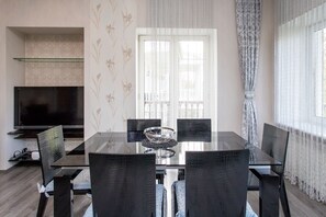 Apartment | Living area | 42-inch LED TV with digital channels