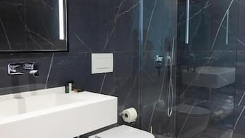 Deluxe Family Room, Balcony, Sea View | Minibar, in-room safe, desk, blackout drapes
