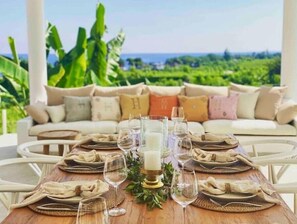 Outdoor dining - Ocean view Boho-Chic villa with large pool and jacuzzi in North Bali (Kecematan Seririt)