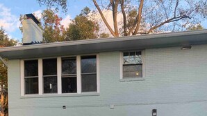 A house with a fire pit in the front yard. - Silver Spring Tranquil Bliss-2BR/1BA Nature/Access (Silver Spring)