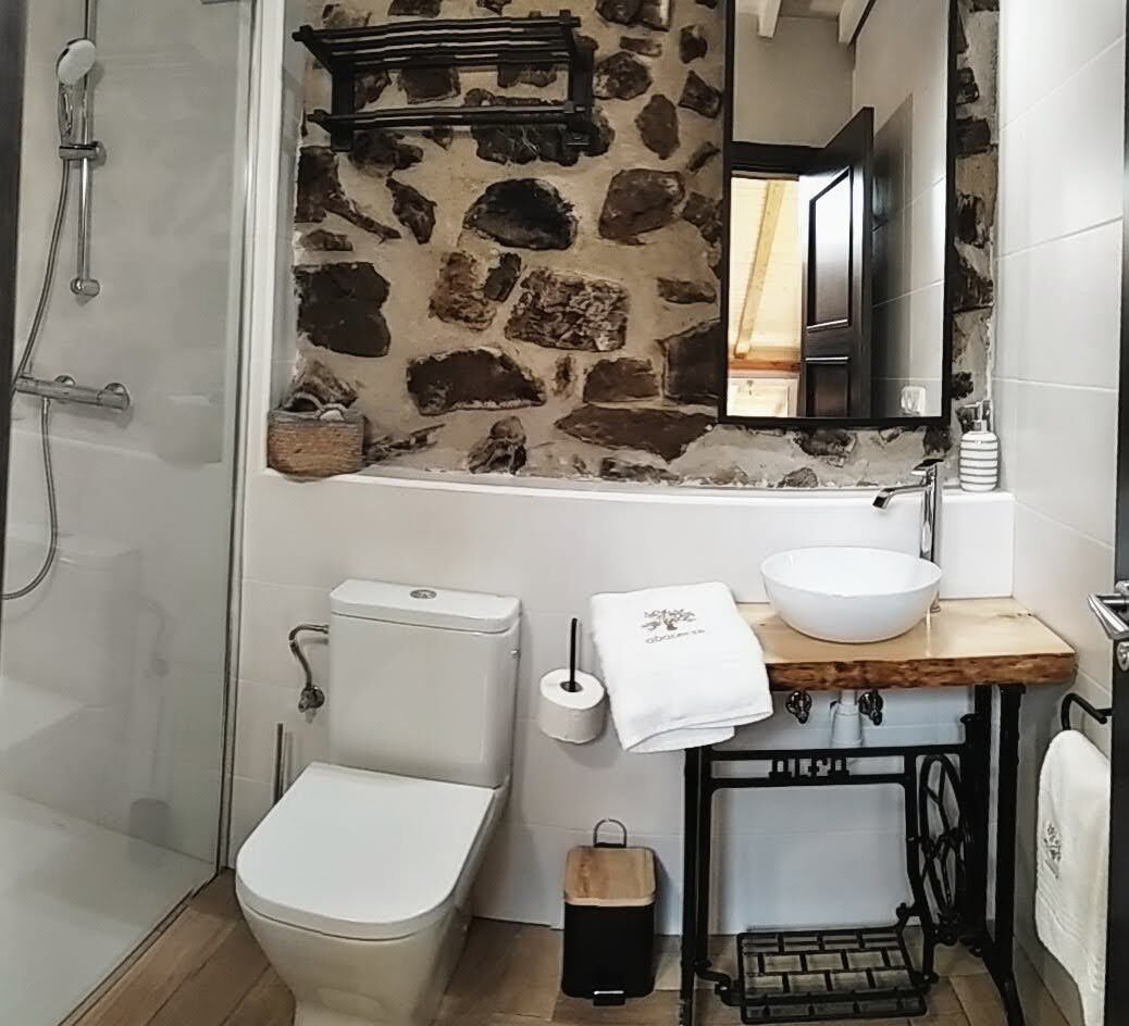 Exclusive Room, 1 King Bed | Bathroom | Hair dryer, towels, soap, toilet paper
