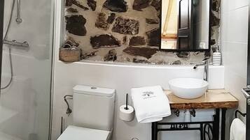 Exclusive Room, 1 King Bed | Bathroom | Hair dryer, towels, soap, toilet paper