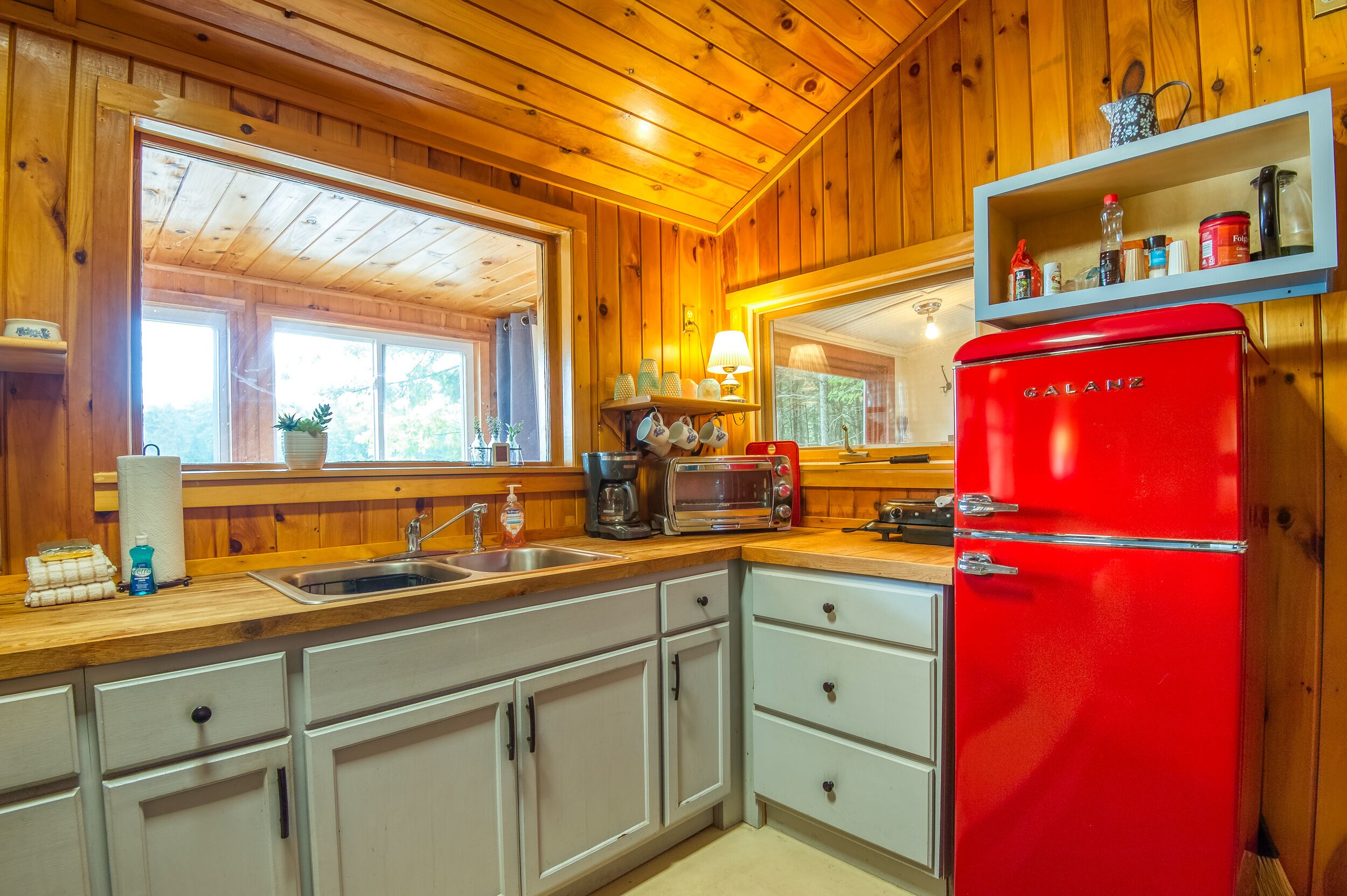 Fridge, coffee/tea maker, toaster, cookware/dishes/utensils