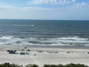 On the beach, sun-loungers, beach towels