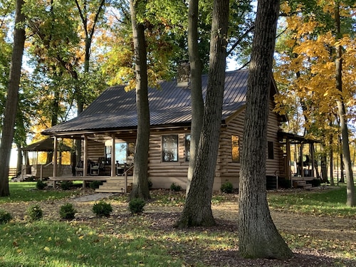 Modern Log Cabin in woods with two gas fireplaces; 20 acres; great location.