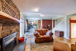 Smart TV, fireplace, books