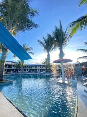 2 outdoor pools, open 9:00 AM to 10:00 PM, pool umbrellas, pool loungers