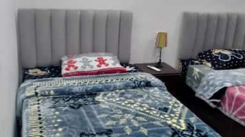 3 habitaciones, tabla de planchar con plancha, wifi y ropa de cama
