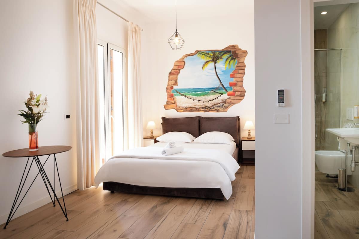 Comfort Double Room, 1 Queen Bed, Beach View | Bathroom | Rainfall showerhead, free toiletries, hair dryer, slippers