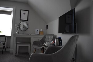 Blackout curtains, iron/ironing board, WiFi, bed sheets