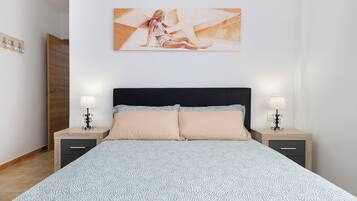 3 dormitorios, tabla de planchar con plancha, wifi gratis y ropa de cama