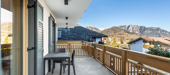 Appartement 'La Sorgente Ville Di Fiemme' avec vue sur les montagnes, terrasse privée et Wi-Fi