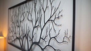 A framed artwork of a tree with intricate branches. - Westfield Blue (Richmond)