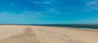 Townhome on the sand with direct beach access, ocean views, deck, & W/D