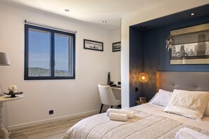 3 habitaciones, tabla de planchar con plancha, wifi y ropa de cama 