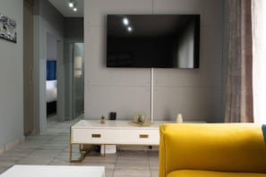 Apartamento | Área de estar | TV