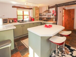 Fridge, electric kettle, cookware/dishes/utensils