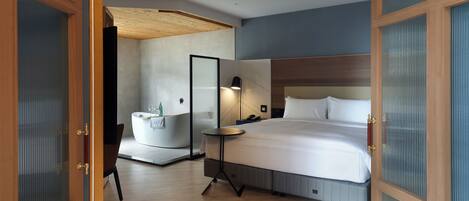 Habitación doble exclusiva, 1 cama King size | Edredón, artículos del minibar gratis, insonorización y wifi gratis