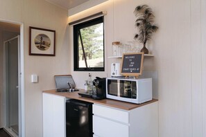 Fridge, microwave, stovetop, coffee/tea maker