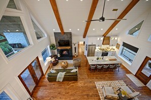 Interior - Magical 3-bed cabin with pool table & hot tub. Greet the day with wooded mountain views, relax by the firepit, then unwind in the bubbling spa. (Broken Bow)