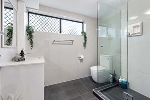 Shower, hair dryer, towels, soap