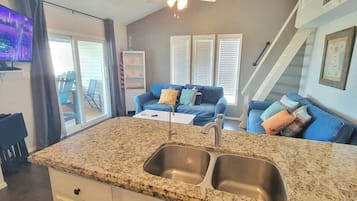 Condo, Multiple Beds, Balcony | Living area | 42-inch flat-screen TV with digital channels, TV