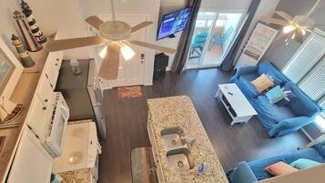 Condo, Multiple Beds, Balcony | Living area | 42-inch flat-screen TV with digital channels, TV