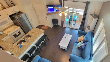 Condo, Multiple Beds, Balcony | Living area | 42-inch flat-screen TV with digital channels, TV