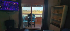 Condo, Multiple Beds, Balcony | Living area